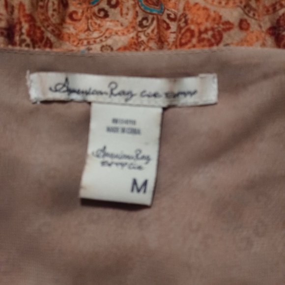 American Rag dress. 💯 Rayon (outer). 💯 polyester (lining). - Picture 5 of 6